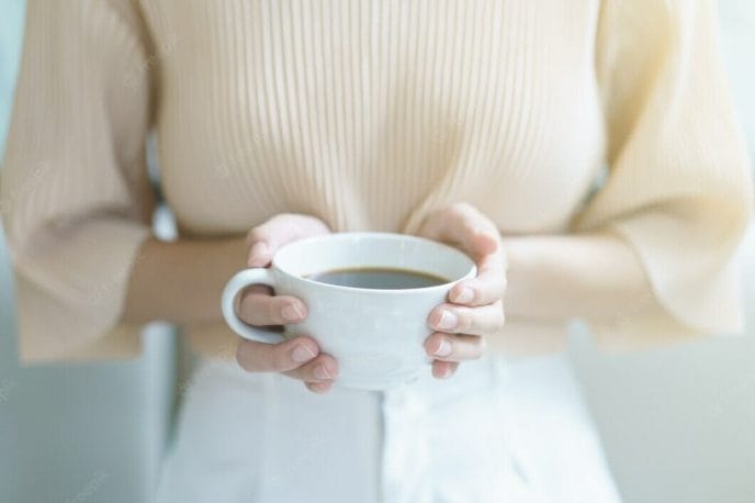woman drinking tea coffee morning 46370 2511